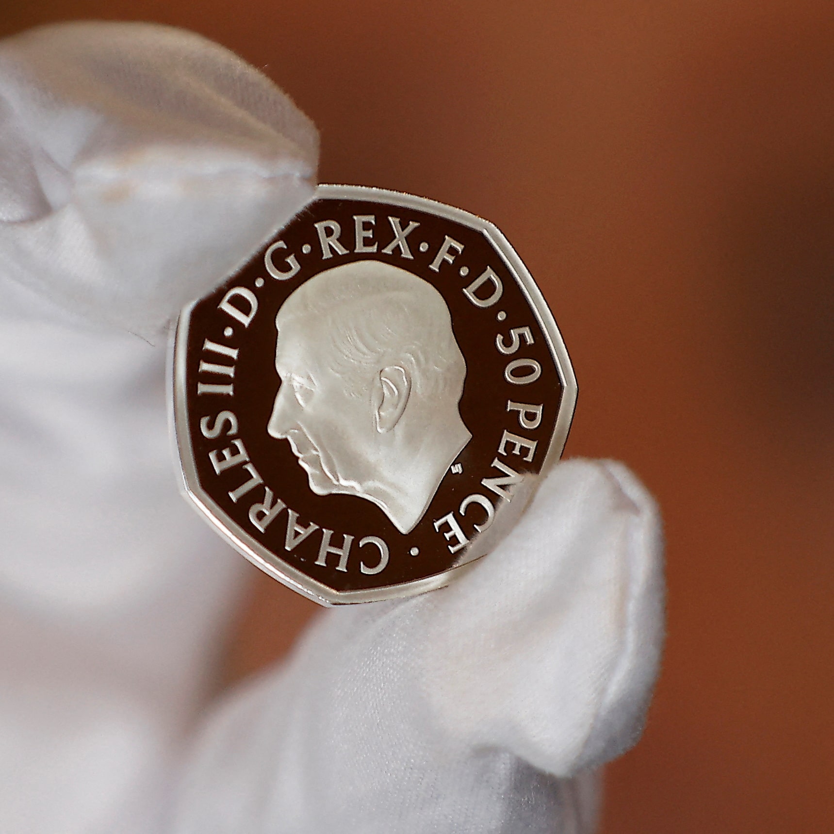 First coinage featuring King Charles III released | King Charles III | The Guardian