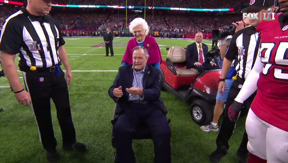 President George H.W. Bush to Perform Super Bowl Coin Toss (#iSpyaChel – Chelsea Clock